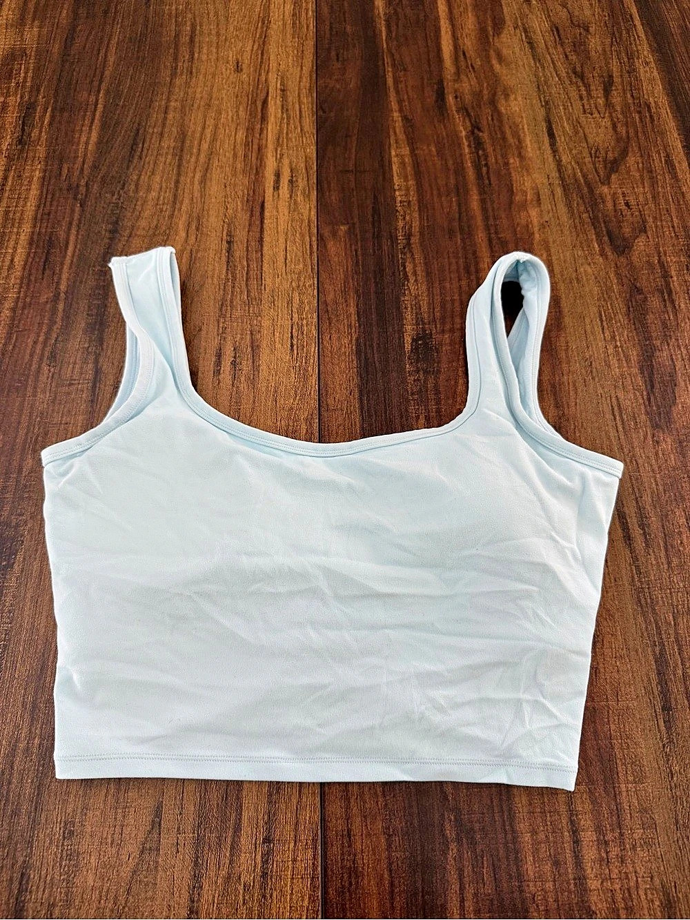 Glowmode twist back Sports Bra in Blue Like New
